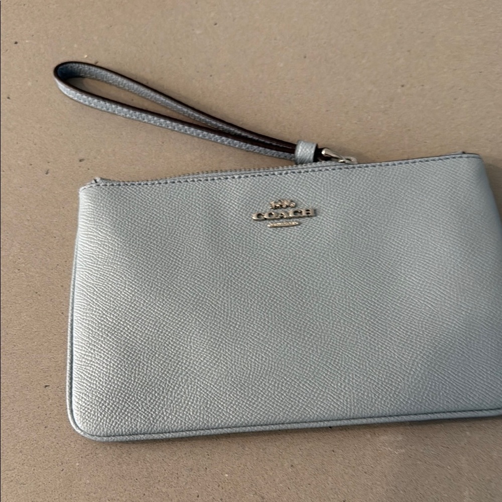 Coach Metallic Light Silver Wristlet with Gold Logo